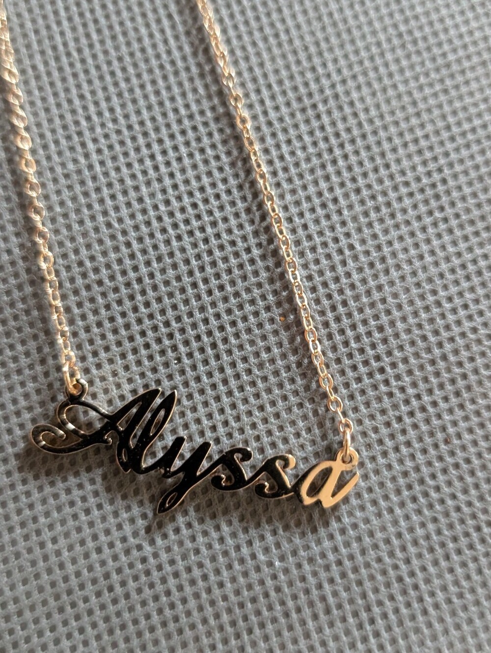 Gold toned Necklace With Name Alyssa
